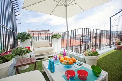 Terrace with table and umbrella