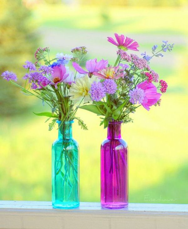 Colored glass bottles like vases