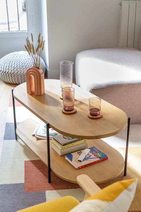 coffee table with open shelf in modern rounded design