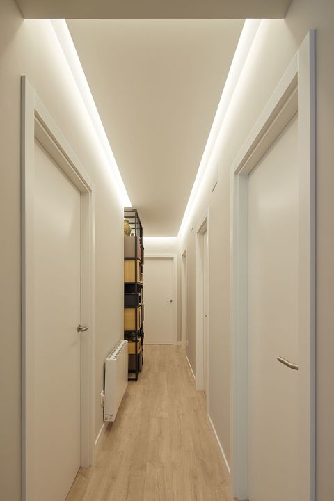 backlit white decorated corridor