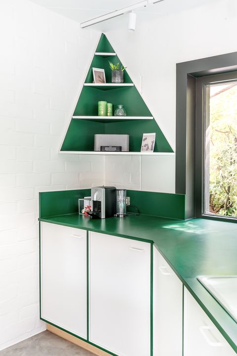 kitchen cabinet and open shelves designed in white and green