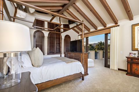 Tuscan-style bedroom with wooden furniture