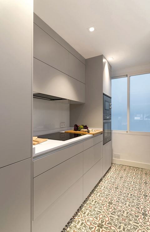 modern kitchen with gray cabinets without handles
