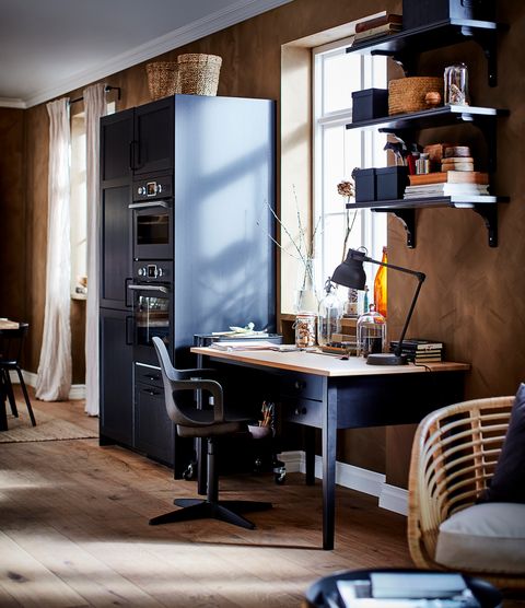 open kitchen with black furniture from the new ikea 2021 catalogue