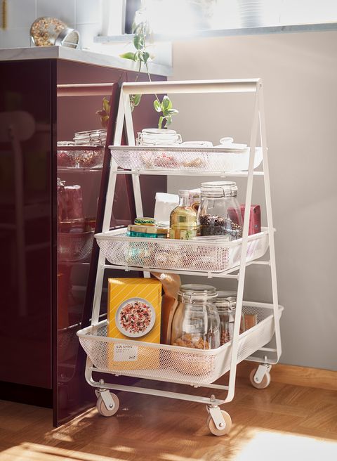 white trolley with wheels and open shelves from the new ikea catalogue 2021