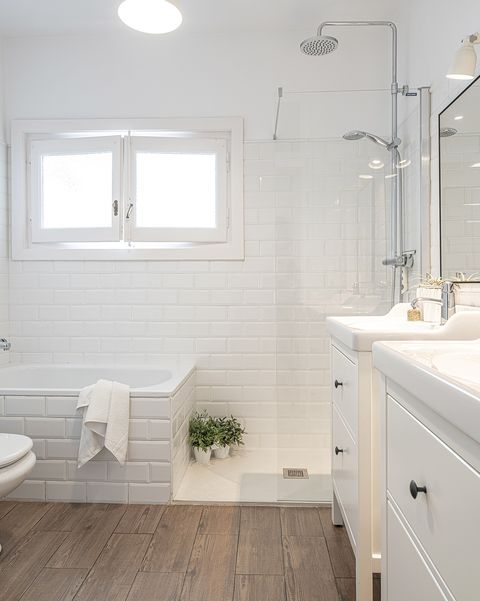 white floor and modern bathroom with bathtub and shower