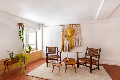living room decorated with macrame tapestry