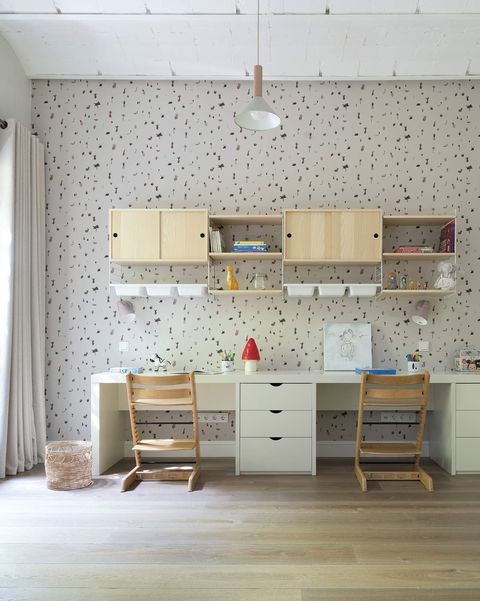 Renovated apartment in barcelona children's bedroom with study area