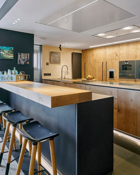 kitchen with industrial design bar in wood and black