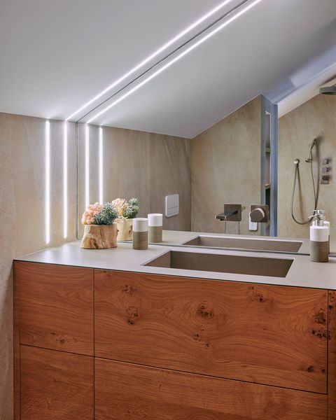 modern bathroom with handleless wooden cabinet