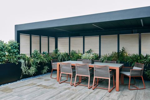 terrace with pergola and dining table