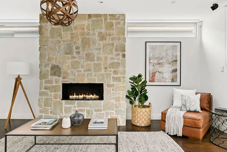 Ideas for decorating a living room with a stone fireplace n.01