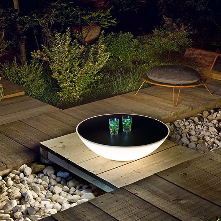 Garden table with built-in lamp