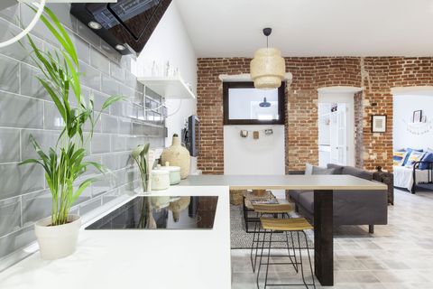 kitchen open to the living room with industrial style