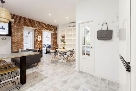 industrial style apartment with exposed brick wall