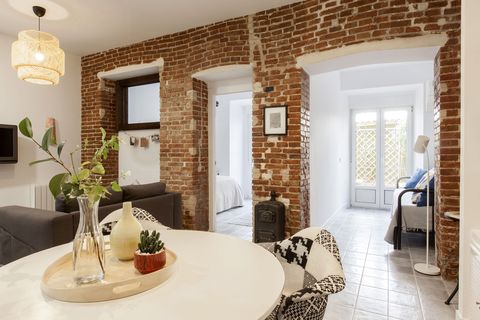 industrial style apartment with exposed brick wall