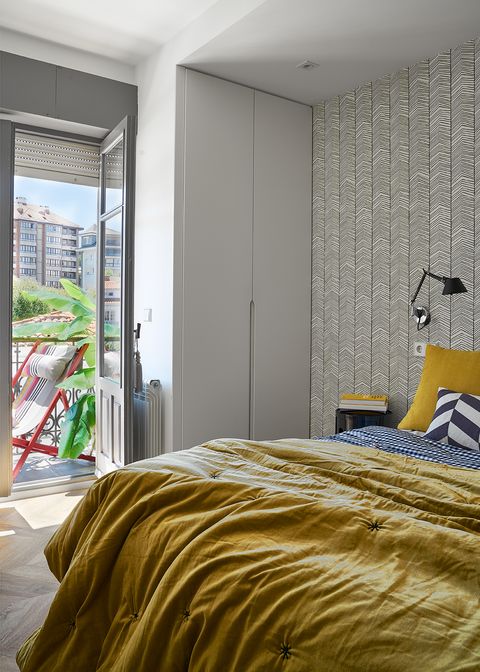 modern bedroom with zigzag wallpaper