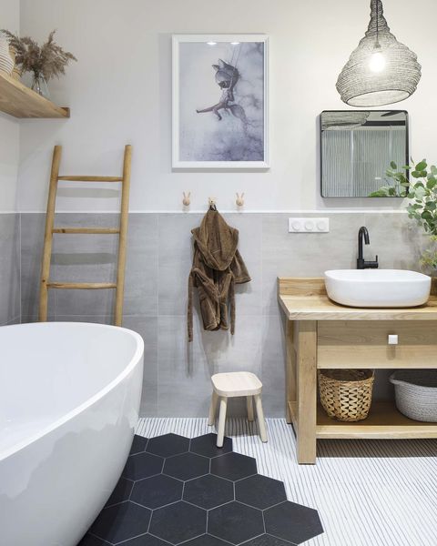a nordic style country house bathroom with freestanding bathtub