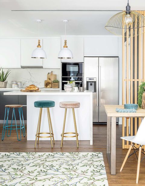 an open and chic kitchen in white