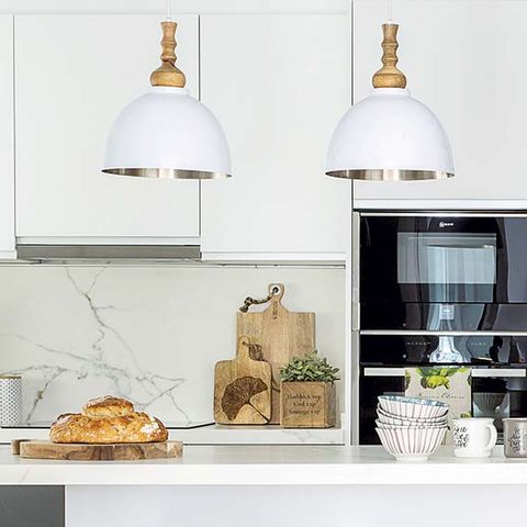 an open and chic kitchen in white