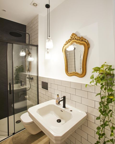 single family house project by laiaubia studio bathroom with shower and mirror with gold frame